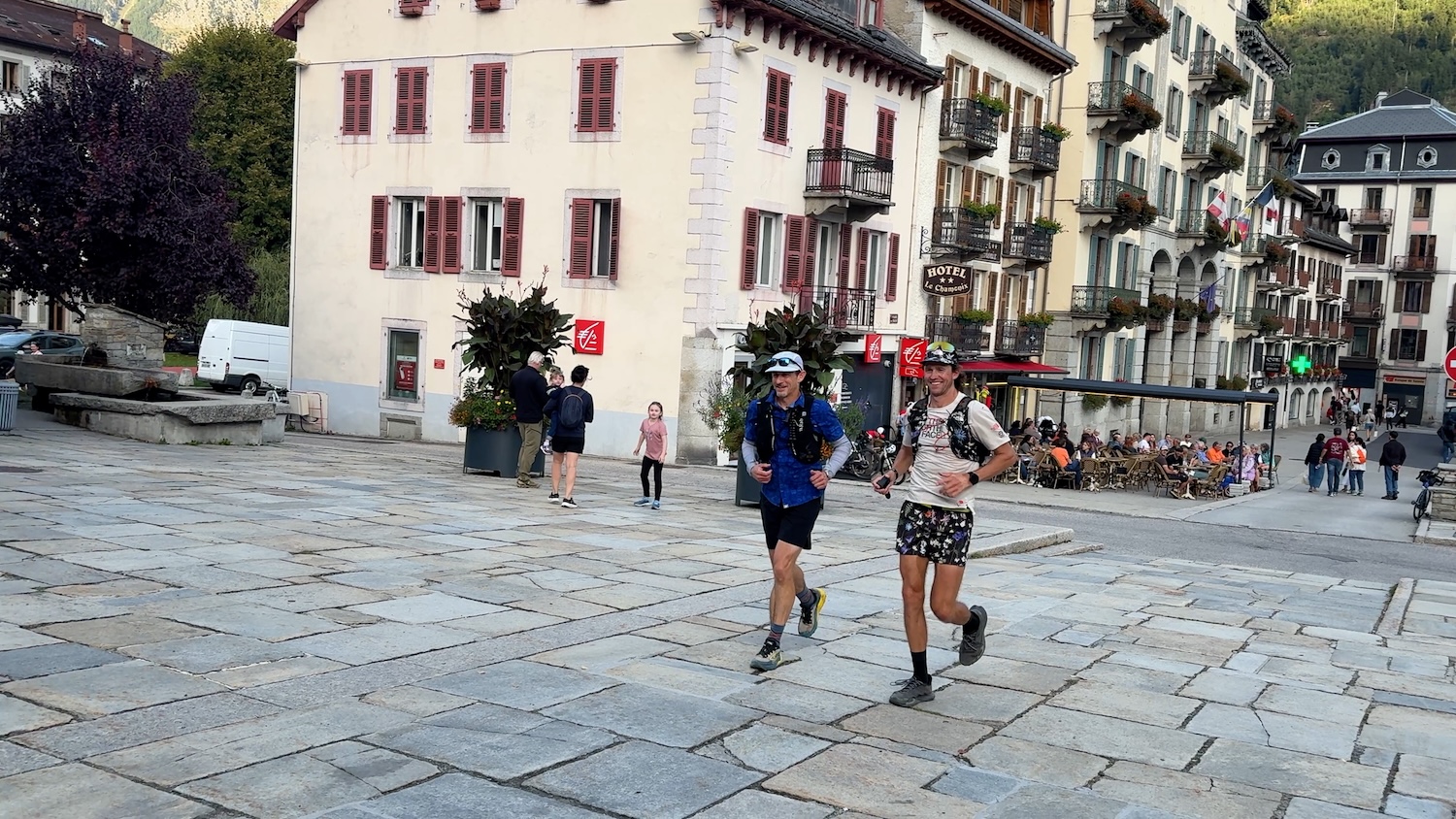 Brendan and Majell finish the Tour du Mont Blanc at the steps of the Église Saint-Michel in Chamonix