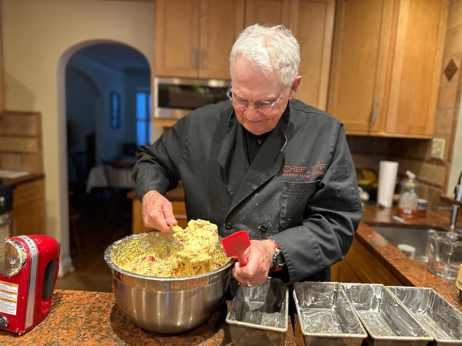 Jeff in the kitchen making cranberry bread
